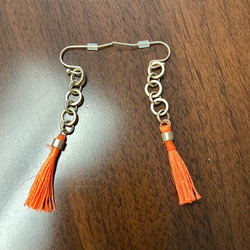 Orange tassel earrings